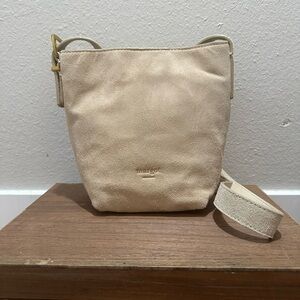 Margot New York Kaye Mini Bucket Suede Beige Leather Crossbody Adjustable Strap.
